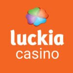 Logótipo oficial do Luckia Casino com fundo cor de laranja e ícone floral colorido.